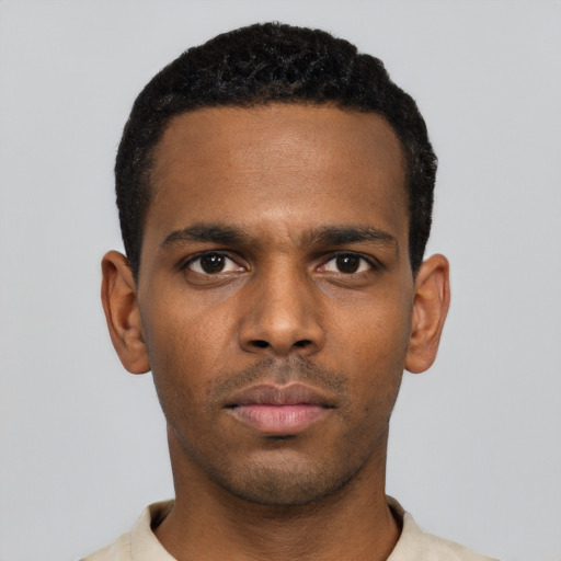 Neutral black young-adult male with short  black hair and brown eyes