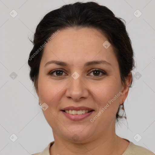 Joyful white adult female with short  brown hair and brown eyes