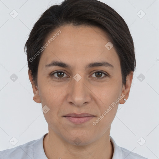 Joyful white adult female with short  brown hair and brown eyes