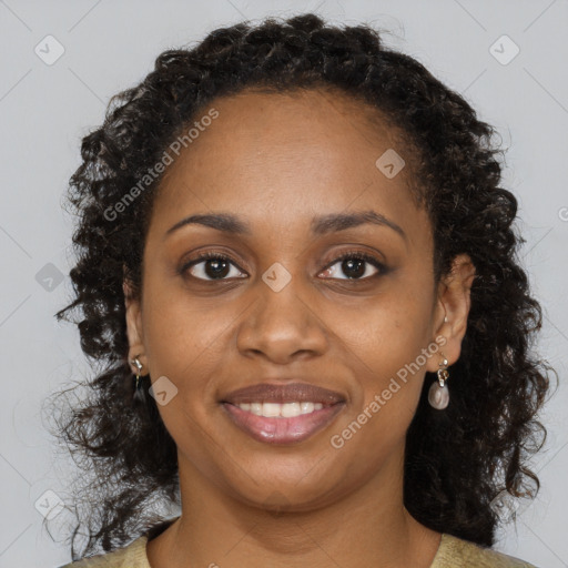 Joyful black young-adult female with medium  brown hair and brown eyes