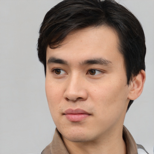 Neutral white young-adult male with short  black hair and brown eyes