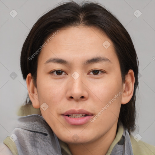 Joyful asian young-adult female with medium  brown hair and brown eyes