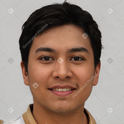 Joyful asian young-adult male with short  black hair and brown eyes