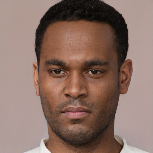 Neutral black young-adult male with short  brown hair and brown eyes