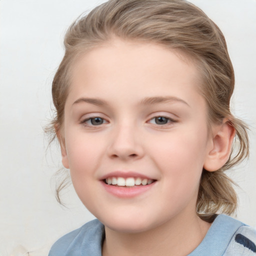 Joyful white child female with medium  brown hair and grey eyes