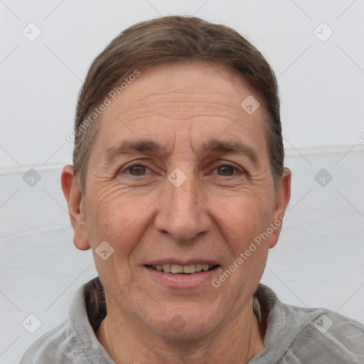 Joyful white middle-aged male with short  brown hair and brown eyes