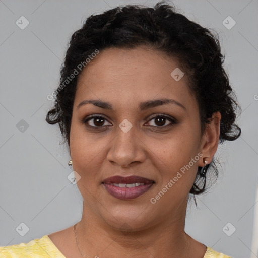 Joyful latino young-adult female with short  brown hair and brown eyes