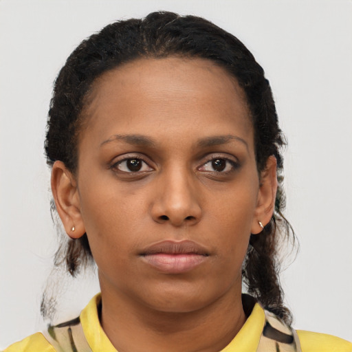 Neutral black young-adult female with short  brown hair and brown eyes