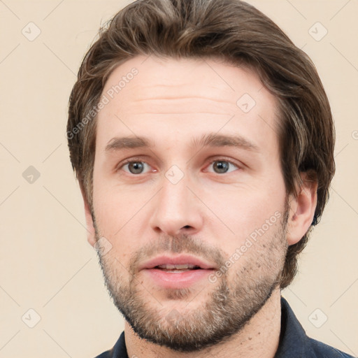 Neutral white young-adult male with short  brown hair and grey eyes