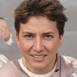 Joyful white adult female with short  brown hair and brown eyes