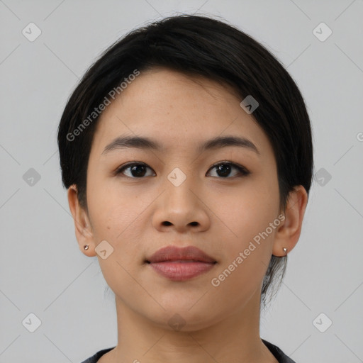 Joyful asian young-adult female with short  black hair and brown eyes