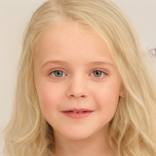 Joyful white child female with long  blond hair and blue eyes