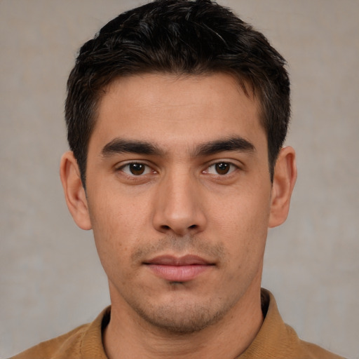 Neutral white young-adult male with short  brown hair and brown eyes
