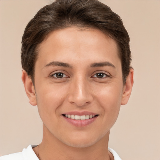 Joyful white young-adult female with short  brown hair and brown eyes