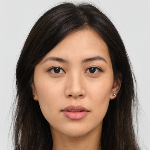 Neutral asian young-adult female with long  brown hair and brown eyes