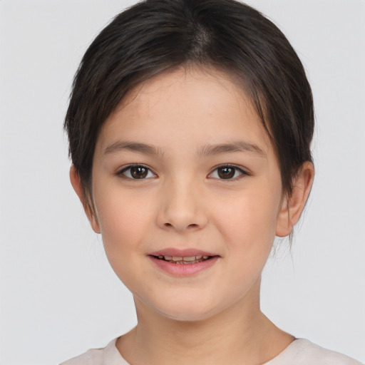 Joyful white child female with short  brown hair and brown eyes