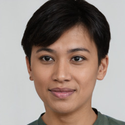 Joyful asian young-adult female with short  black hair and brown eyes