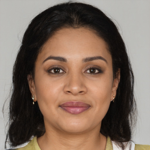 Joyful asian young-adult female with medium  brown hair and brown eyes