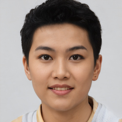 Joyful asian young-adult female with short  black hair and brown eyes