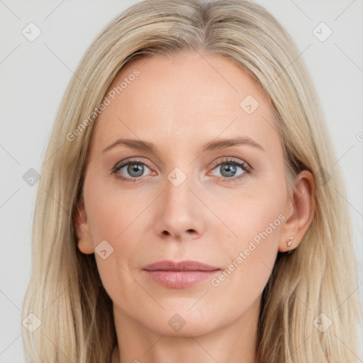 Joyful white young-adult female with long  brown hair and blue eyes