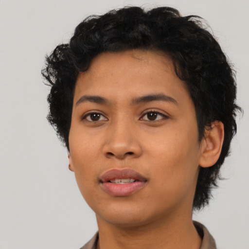 Neutral latino young-adult female with short  black hair and brown eyes