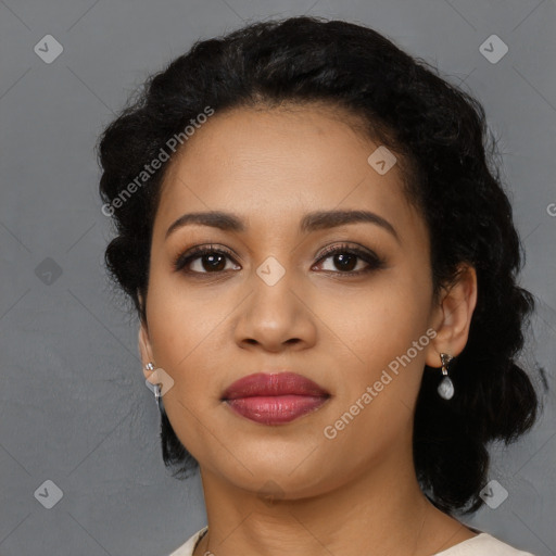 Joyful latino young-adult female with long  black hair and brown eyes