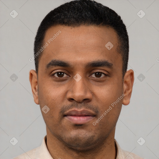 Neutral latino young-adult male with short  black hair and brown eyes