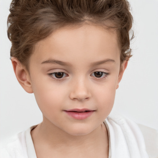 Joyful white child female with short  brown hair and brown eyes