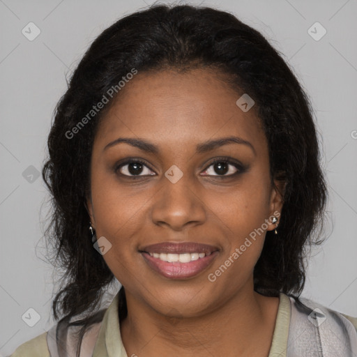 Joyful black young-adult female with long  brown hair and brown eyes