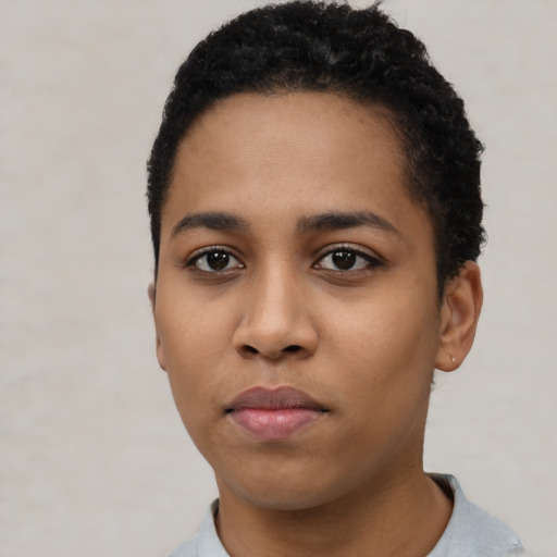 Neutral latino young-adult female with short  black hair and brown eyes