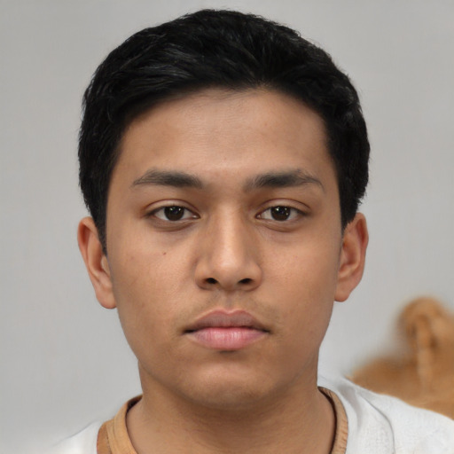 Neutral asian young-adult male with short  black hair and brown eyes