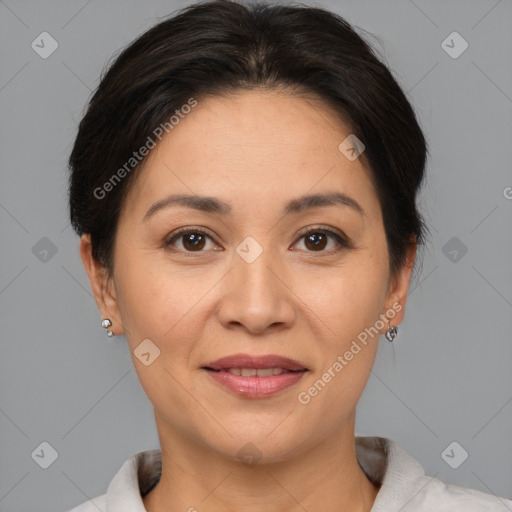 Joyful white adult female with short  brown hair and brown eyes