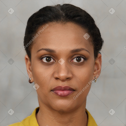 Joyful black young-adult female with short  brown hair and brown eyes