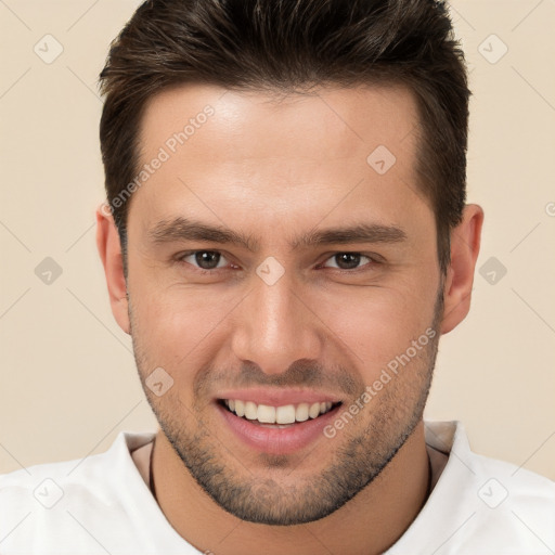 Joyful white young-adult male with short  brown hair and brown eyes