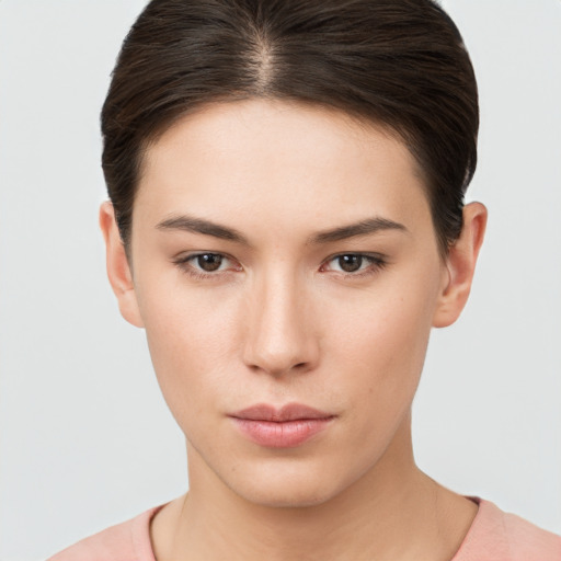 Neutral white young-adult female with short  brown hair and brown eyes