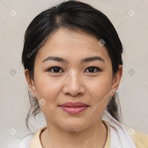 Joyful asian young-adult female with medium  brown hair and brown eyes