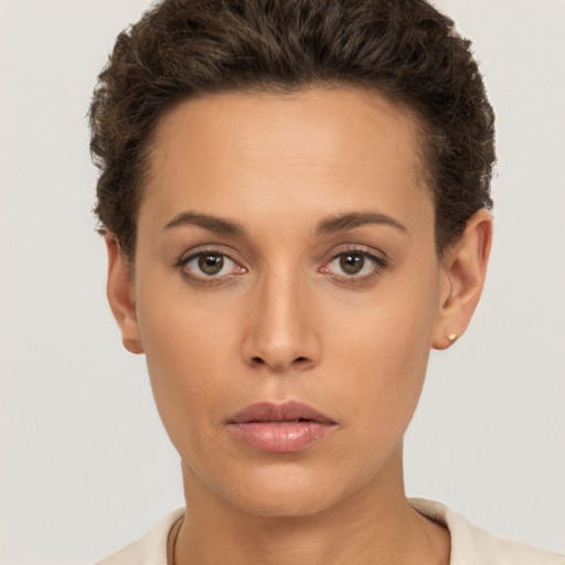 Neutral white young-adult female with short  brown hair and brown eyes