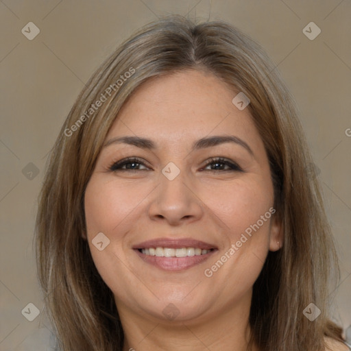 Joyful white adult female with medium  brown hair and brown eyes