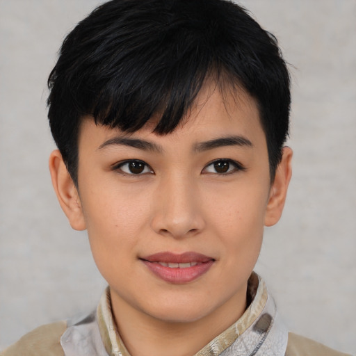 Joyful asian young-adult female with short  brown hair and brown eyes