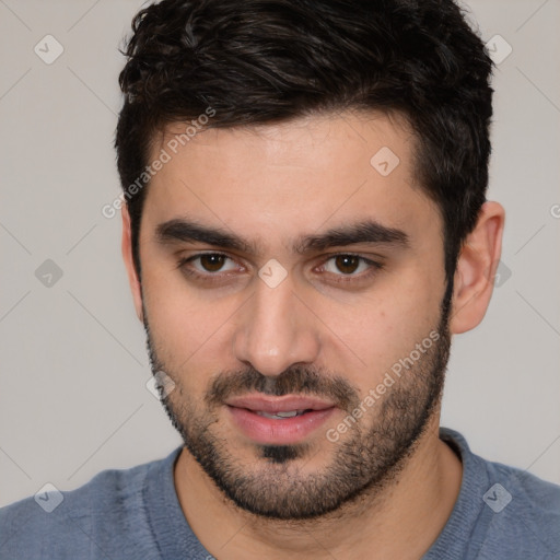 Joyful white young-adult male with short  black hair and brown eyes