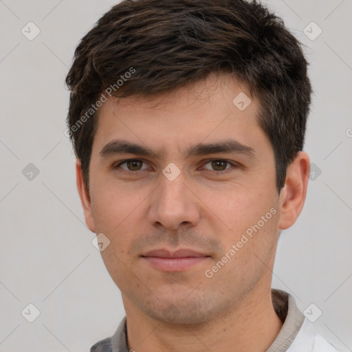 Neutral white young-adult male with short  brown hair and brown eyes