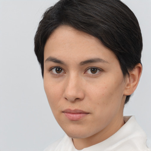 Joyful asian young-adult female with short  brown hair and brown eyes