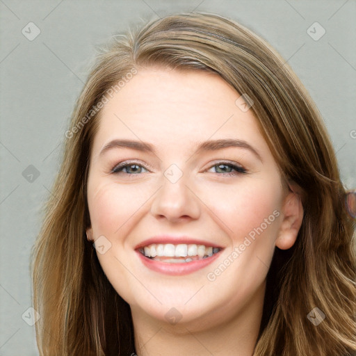 Joyful white young-adult female with long  brown hair and blue eyes