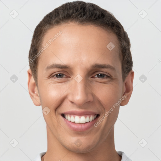 Joyful white young-adult female with short  brown hair and brown eyes