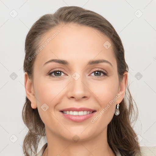 Joyful white young-adult female with long  brown hair and grey eyes