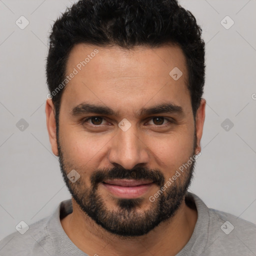Joyful white young-adult male with short  black hair and brown eyes
