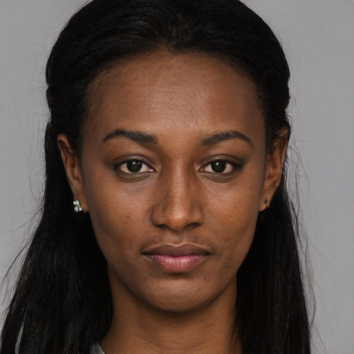 Neutral black young-adult female with long  black hair and brown eyes