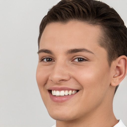 Joyful white young-adult female with short  brown hair and brown eyes