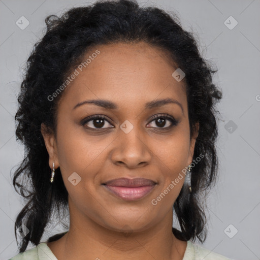 Joyful black young-adult female with medium  brown hair and brown eyes