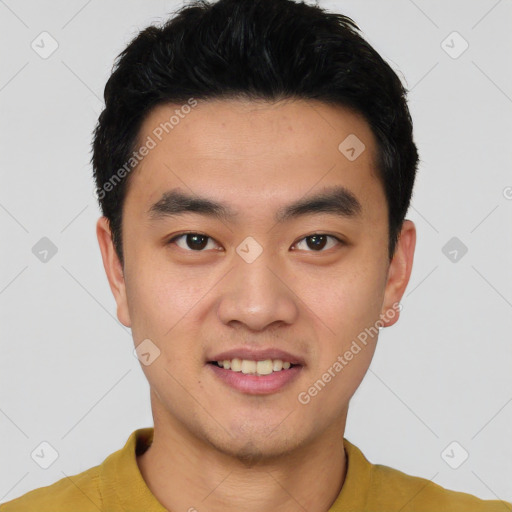 Joyful white young-adult male with short  black hair and brown eyes